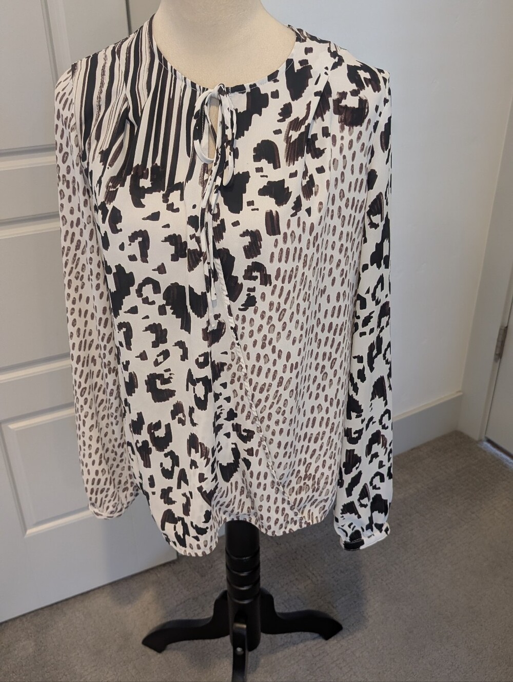 CAbi Black and White Mixed Animal Print Tie-Neck Blouse